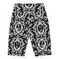 High-waisted Queen's Beloved Bunny Biker Shorts feature a stylish black and white floral pattern for versatile elegance.