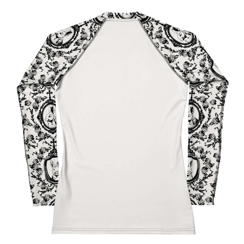 Queen's Beloved Bunny Rash Guard features elegant design, perfect for active moments in or out of the water.