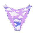 Cloudy Sky V-cut bikini bottom in soft purple with a high-leg cut, offering UPF 50+ sun protection and recycled fabric.