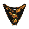 Enchanted Rose V-cut Bikini Bottom featuring vibrant rose print on a black background, perfect for sunny beach days.