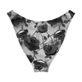 V-cut bikini bottom with black rose print against lace design for a chic summer look.