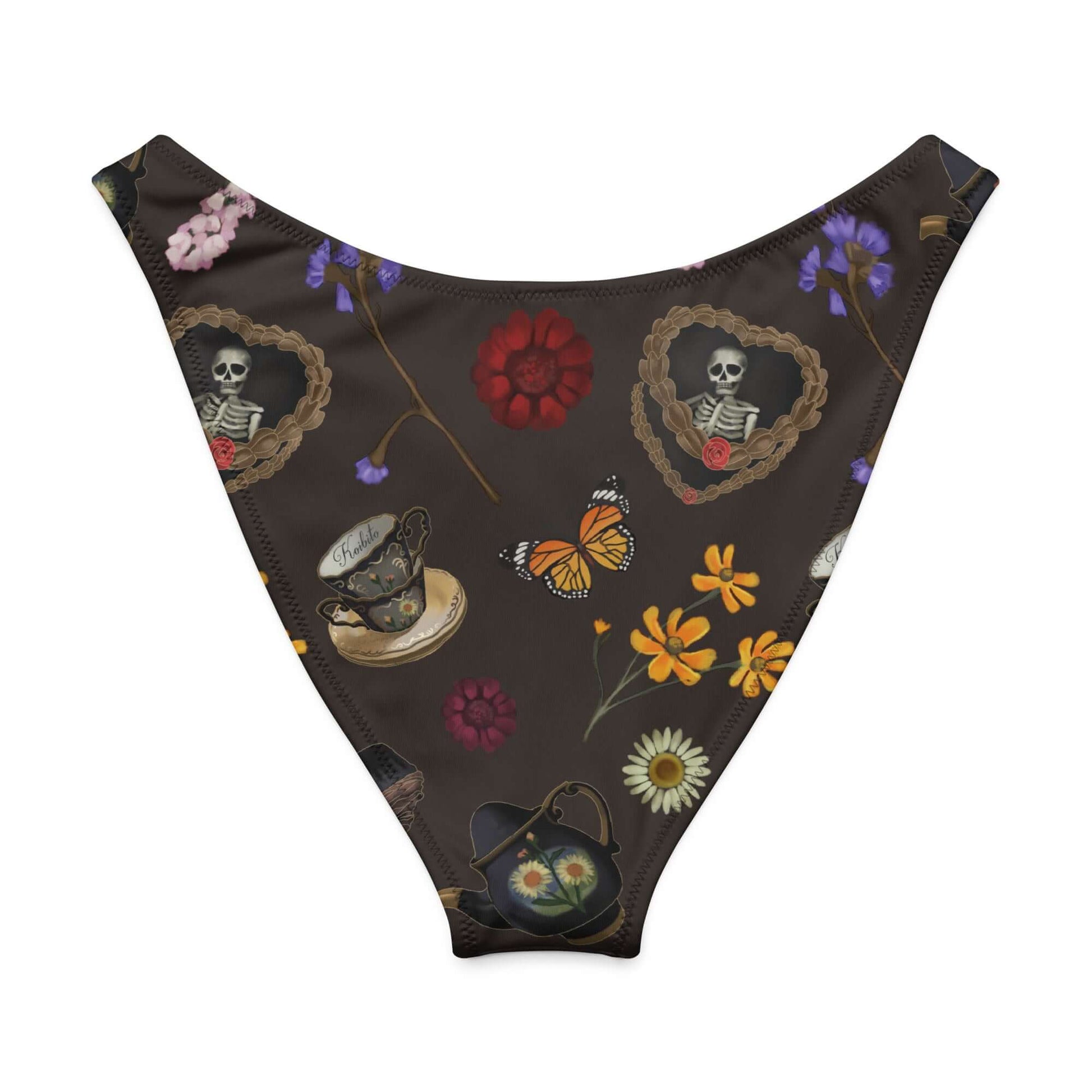 Gothic Tea Time V-cut bikini bottom featuring skeletons, flowers, and teacups on a dark background.