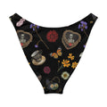 Gothic tea time V-cut bikini bottom with floral and skeleton designs on a black background.