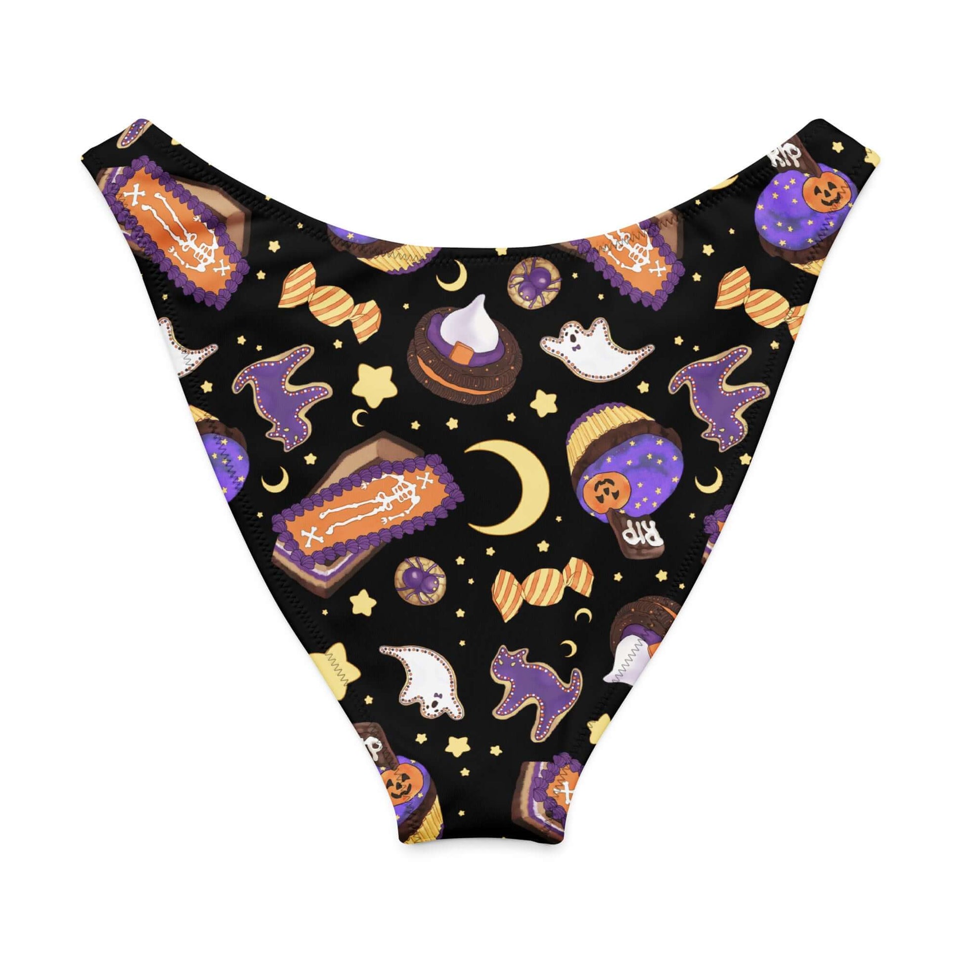 Halloween treat V-cut bikini bottom with festive ghost and dessert patterns on a black background.