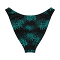 Higanbana V-cut bikini bottom with teal floral design on a black background, featuring high-leg cut for a flattering fit.