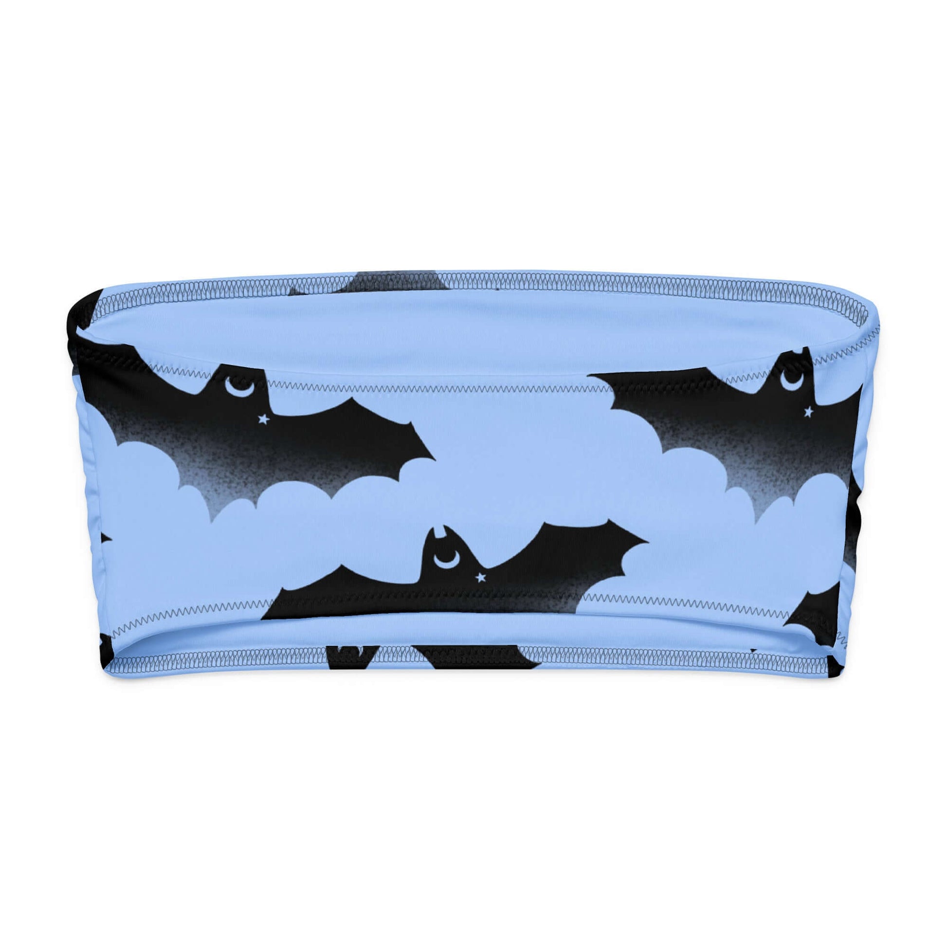Lilith bandeau bikini top with a playful bat and cloud pattern on a light blue background.