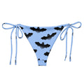 Shop the Lilith String Bikini Bottom, perfect for summer poolside relaxation with stylish bat designs and adjustable ties.