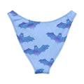 Lilith V-cut bikini bottom in light blue with bat print, high-leg cut, soft fabric, and UPF 50+ protection.