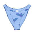 Lilith V-cut bikini bottom in light blue with bat and cloud design, perfect for stylish summer lounging.