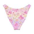 Magical Girl V-cut bikini bottom featuring pastel prints of moons, stars, and bows in pink and yellow hues.