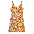 Momiji Skater Dress showcasing warm tones and pink accents, perfect for fall occasions with a flared skirt design.