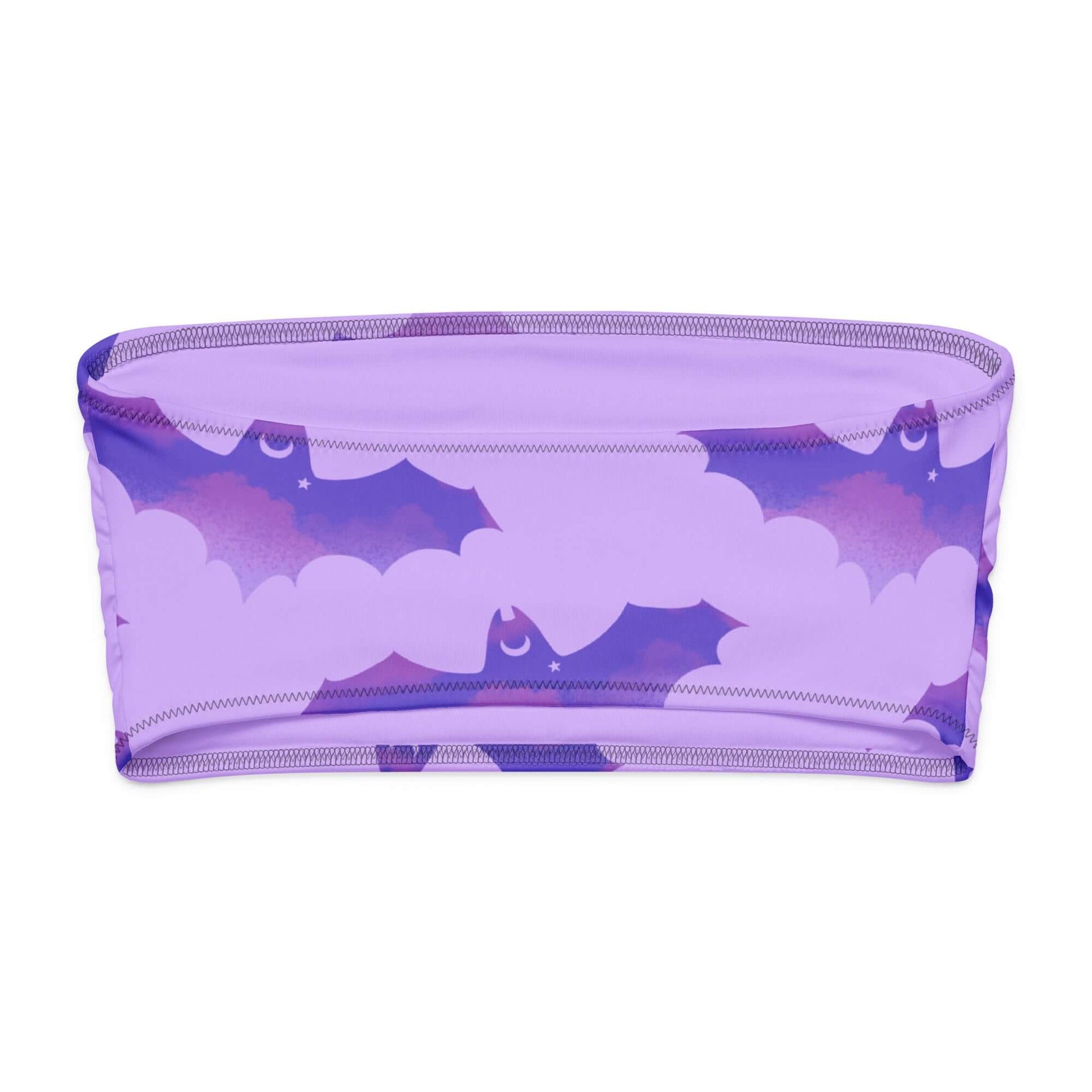 Morrigan bandeau bikini top featuring a whimsical bat and cloud design in soft purple fabric.