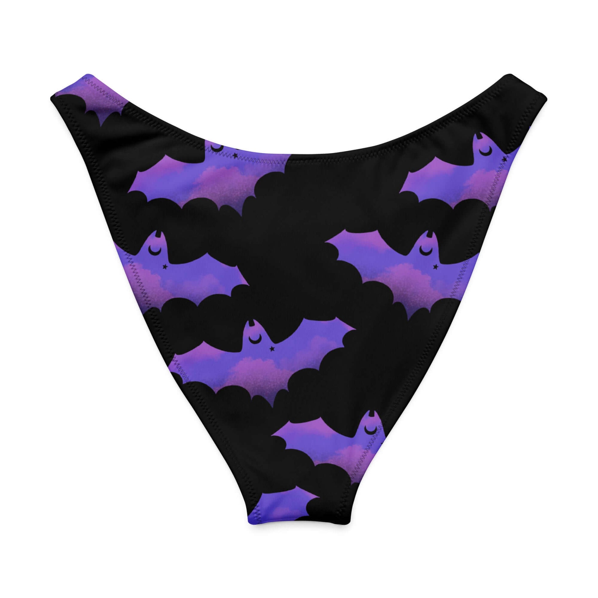 Morrigan V-cut bikini bottom featuring playful bat and cloud design in purple and black, perfect for a stylish beach day.