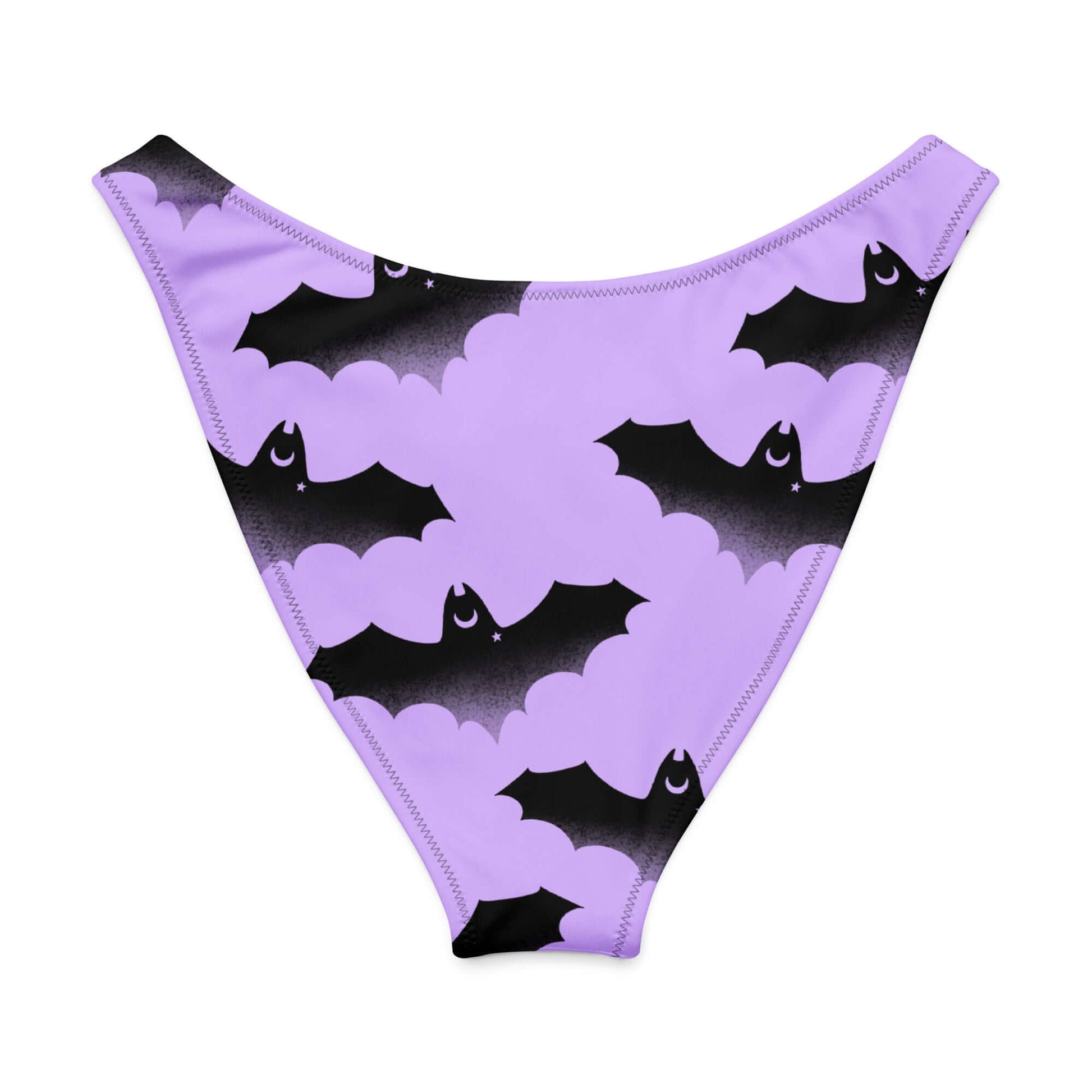 Morrigan V-cut bikini bottom in lavender with bat and cloud pattern, perfect for sunny days and stylish comfort.