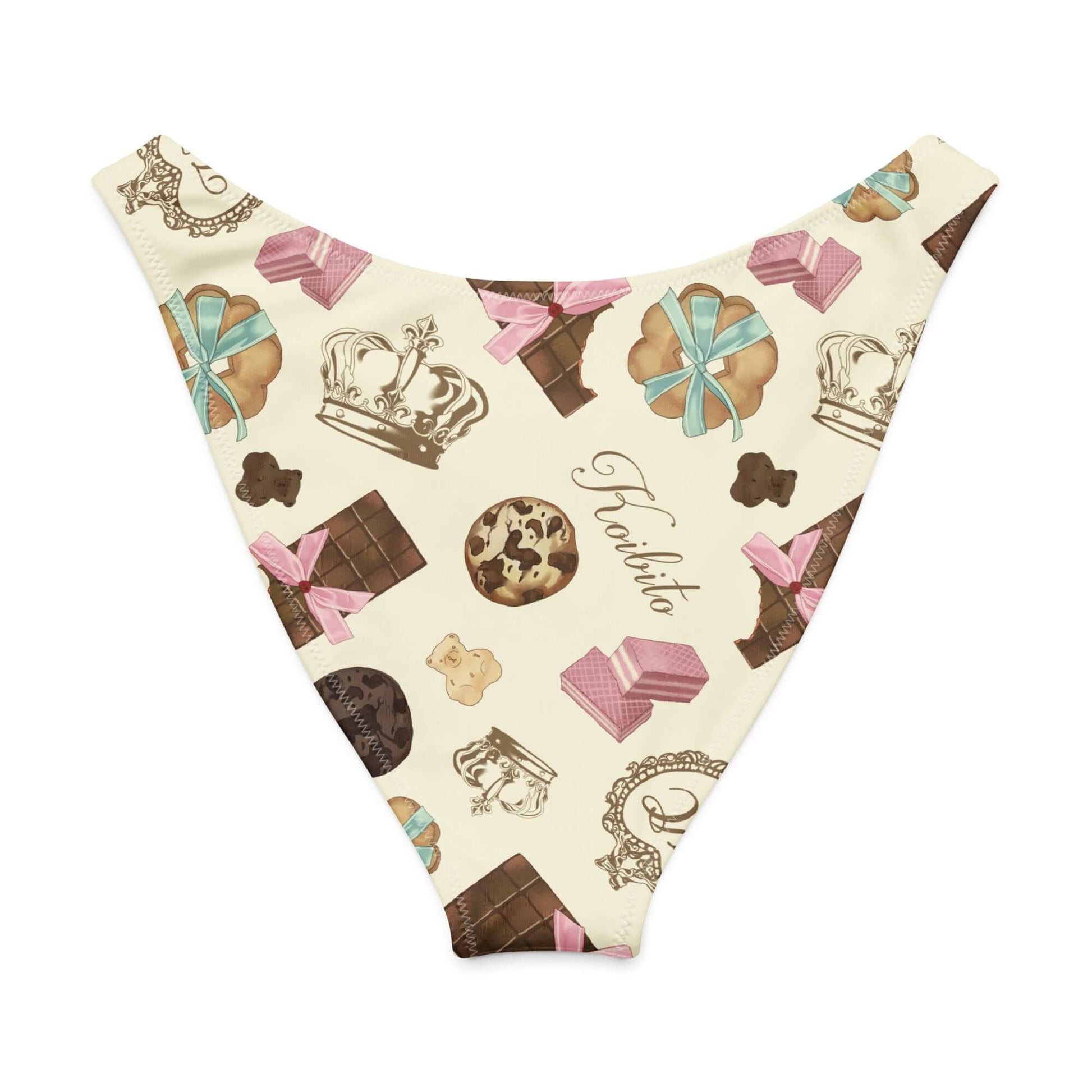 Royal Cookie V-cut bikini bottom featuring a whimsical pattern of chocolates and crowns in soft colors.