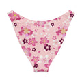 Sakura V-cut bikini bottom with floral design, high-leg cut, soft fabric and UPF 50+ protection for sunny beach days.