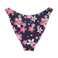 Sakura V-cut bikini bottom featuring a floral pattern on a navy background, perfect for sunny beach days.