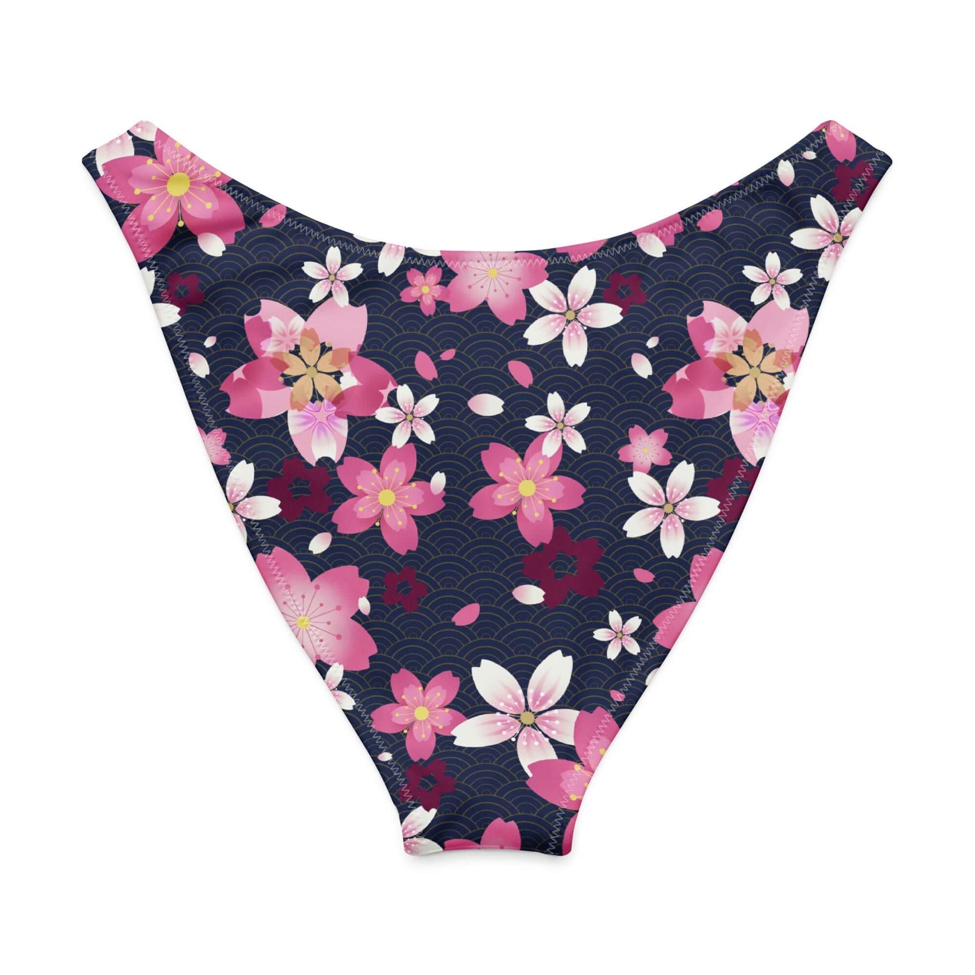 Sakura V-cut bikini bottom featuring a floral pattern on a navy background, perfect for sunny beach days.