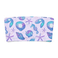 Colorful sea shell and starfish pattern on a stylish bandeau bikini top for beachwear fun.