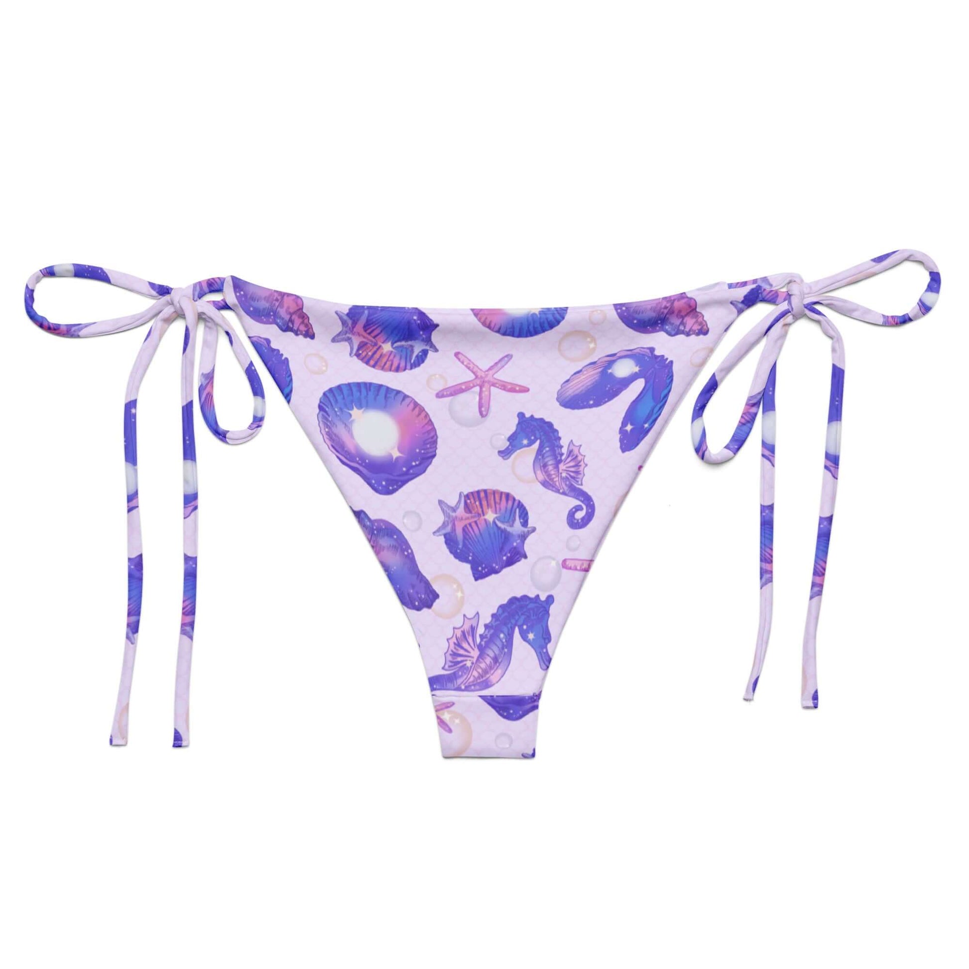 Stylish Sea Princess String Bikini Bottom featuring a colorful seashell design, perfect for poolside relaxation.