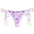 Relax by the pool in the stylish Sea Princess String Bikini Bottom, featuring a vibrant seashell print and adjustable straps.