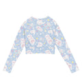 Snow Puppy Long-sleeved Crop Top features a playful design, perfect for eco-friendly athleisure and everyday wear.