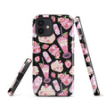 Stylish Strawberry iPhone® Tough Case featuring a pink and black dessert pattern for durable phone protection.