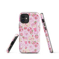 Stylish Strawberry iPhone® Tough Case featuring a pink dessert pattern for durable phone protection.