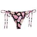 Stylish Strawberry String Bikini Bottom featuring vibrant prints, perfect for sunbathing poolside with UPF 50+ protection.