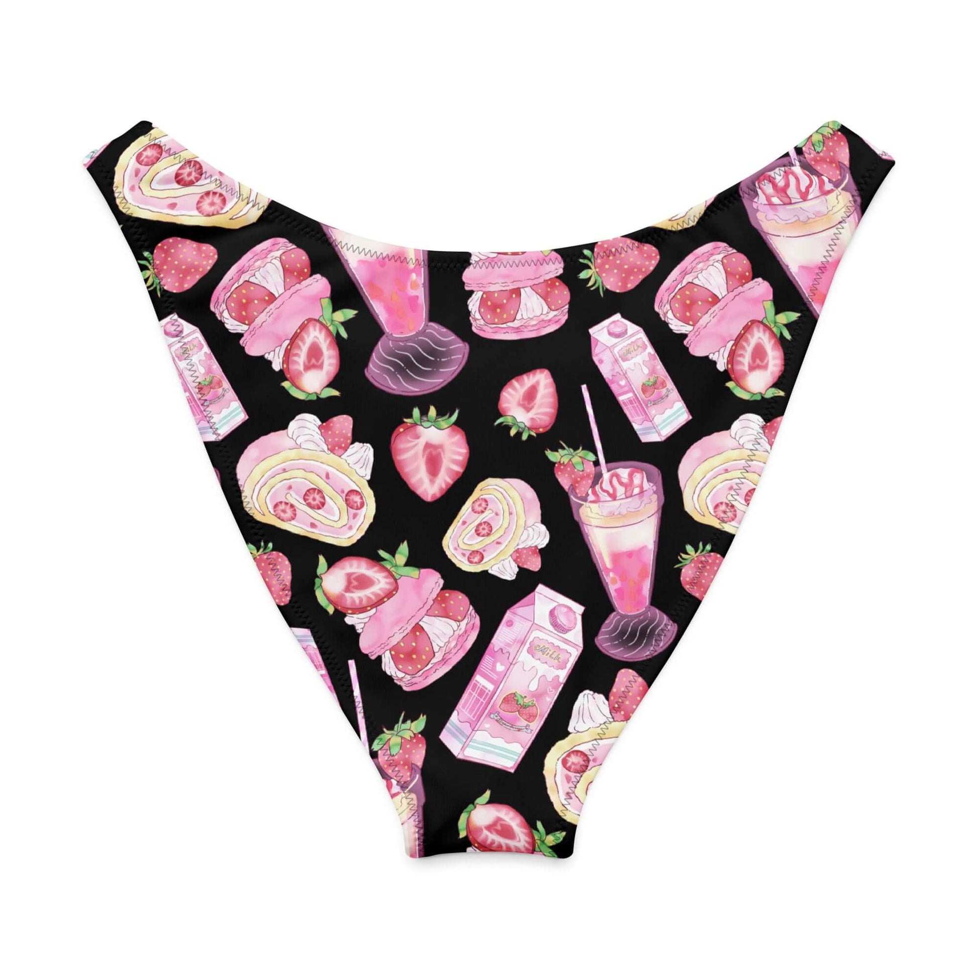Playful strawberry-patterned V-cut bikini bottom with colorful desserts on a black background.