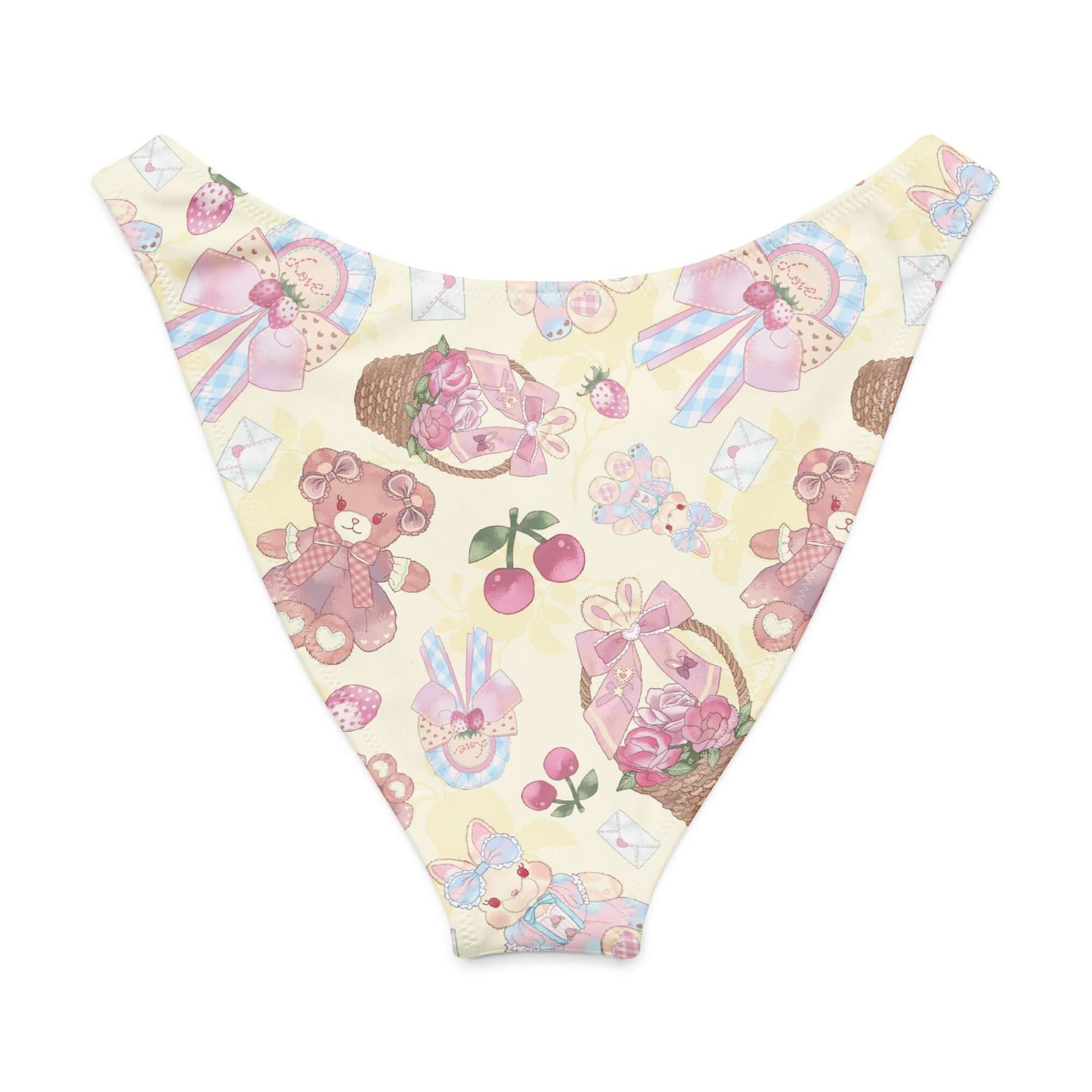 Sweet Teddy V-cut bikini bottom with cute teddy bear and cherry patterns on a soft yellow background.