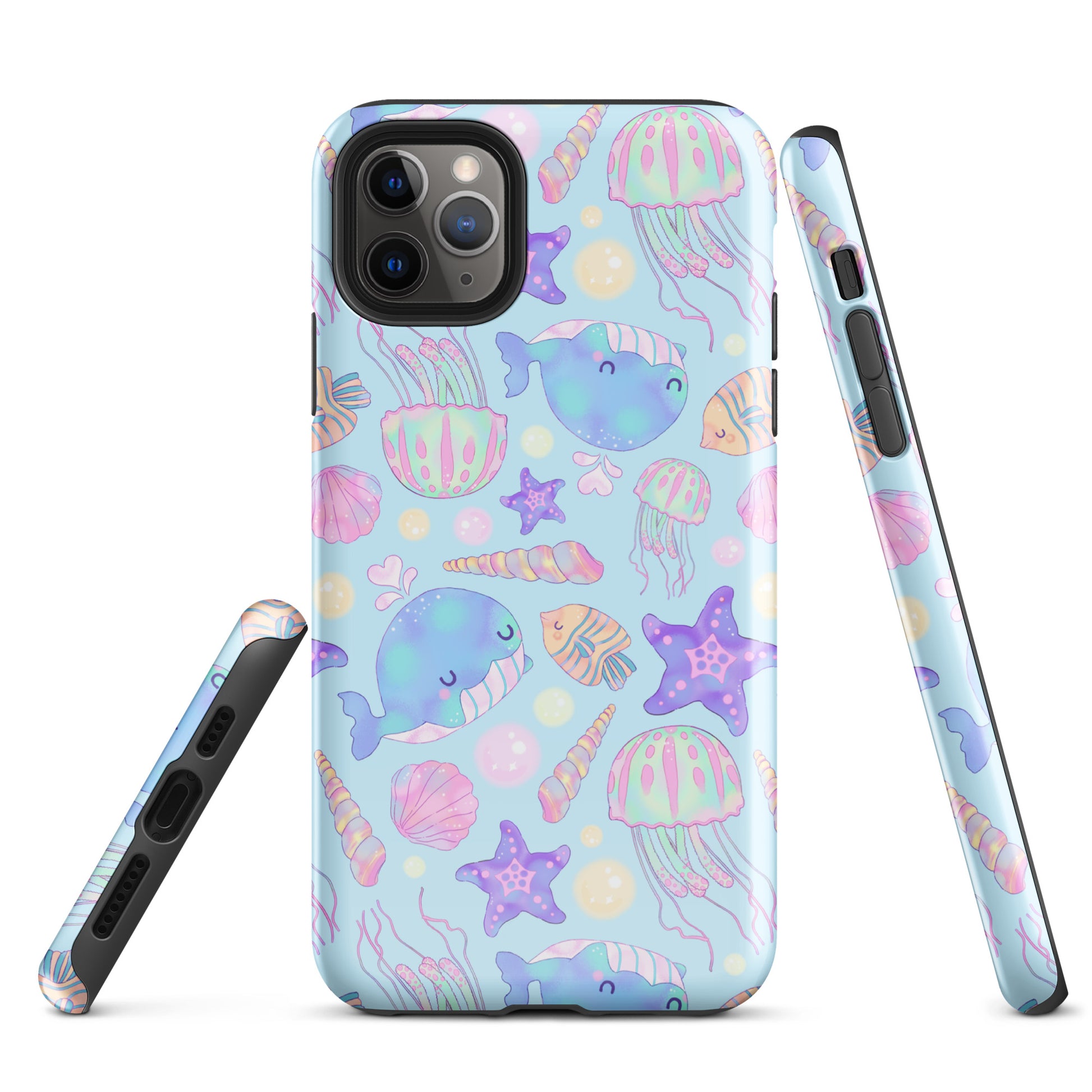 Stylish Under the Sea iPhone® Tough Case features colorful sea life, offering durable protection for your phone year-round.