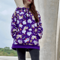 Vibrant Trick or Treaters Hoodie perfect for Halloween festivities, comfy for year-round wear at your favorite store.