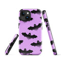 Stylish Aensland iPhone® Tough Case in purple bat design offers durable, dual-layer protection for your device.