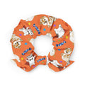 Bright orange Trick or Treaters Scrunchie with cute animal designs, perfect for Halloween style and fun.