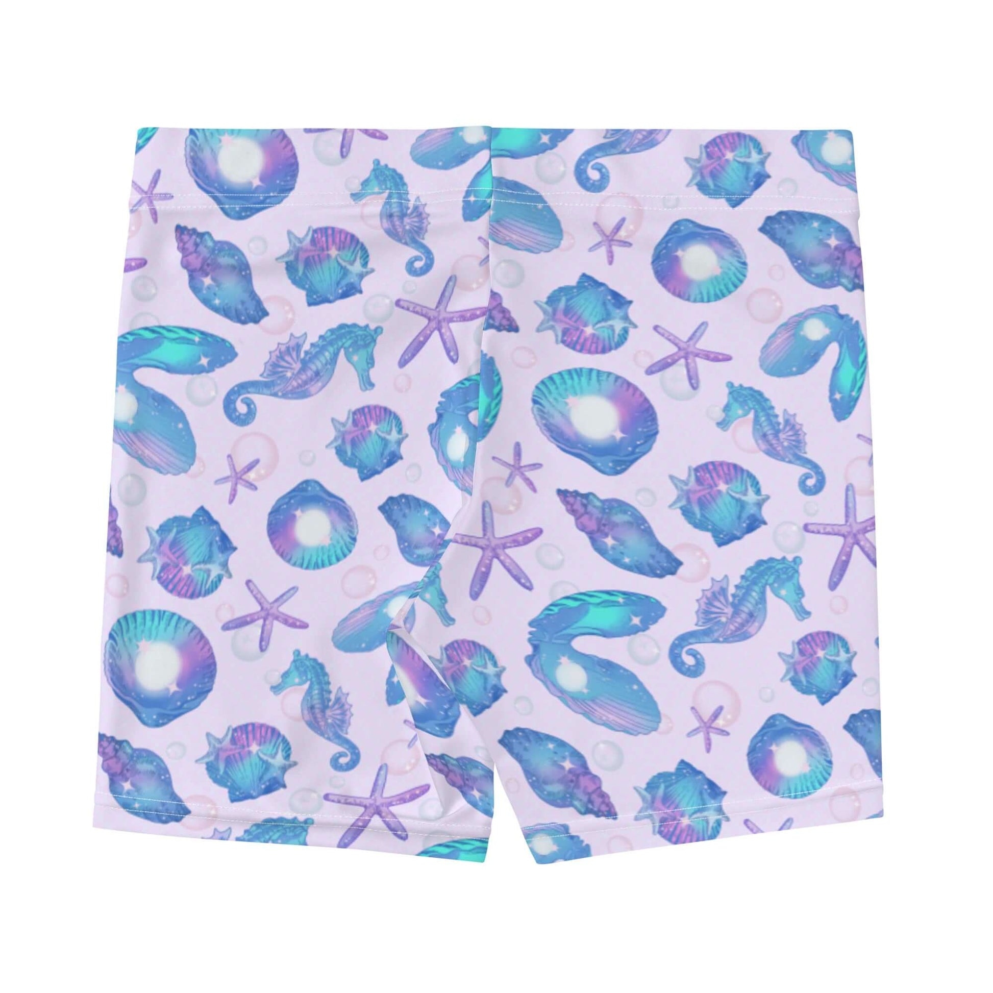 Stylish Sea Princess Shorts featuring a vibrant seashell pattern, perfect for summer activities and beach runs.