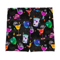 Freaky-fun Monster Party Shorts featuring vibrant drinks and skulls, perfect for workouts and casual wear.