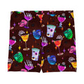 Freaky-fun Monster Party Shorts featuring vibrant drinks and skulls, perfect for workouts and staying stylish.