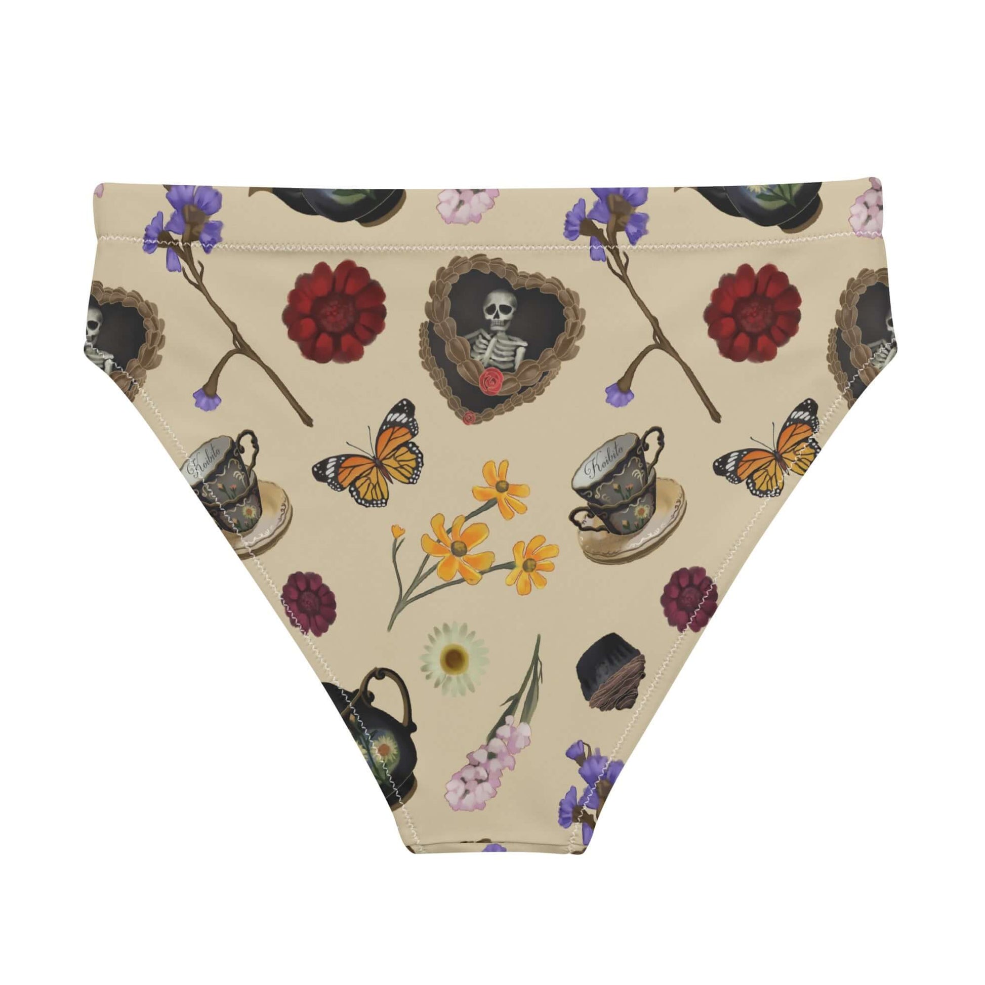 High-waisted Gothic Tea Time Bikini Bottom features a unique floral and skull print, perfect for stylish summer outings.