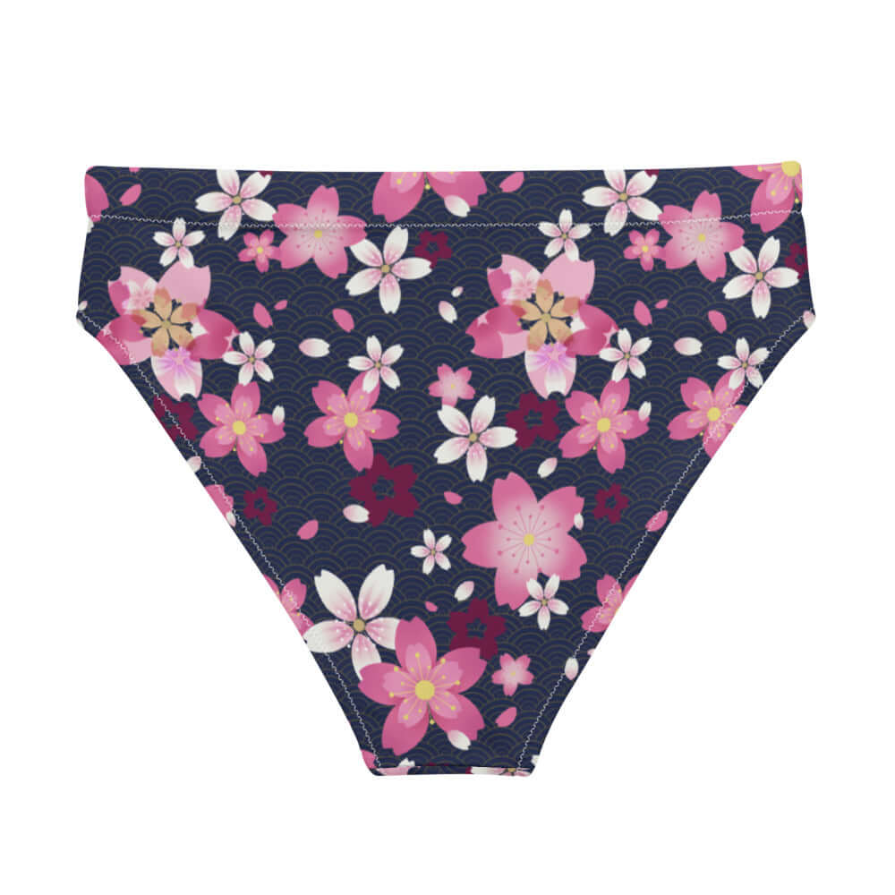 High-waisted Sakura Bikini Bottom features a floral design, perfect for spring beach days or spa visits.