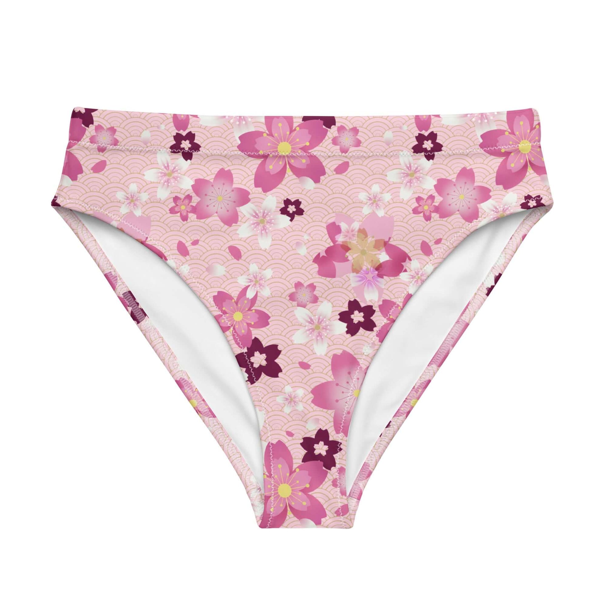 High-waisted Sakura Bikini Bottom features a floral design, perfect for beach days and spa visits this spring.