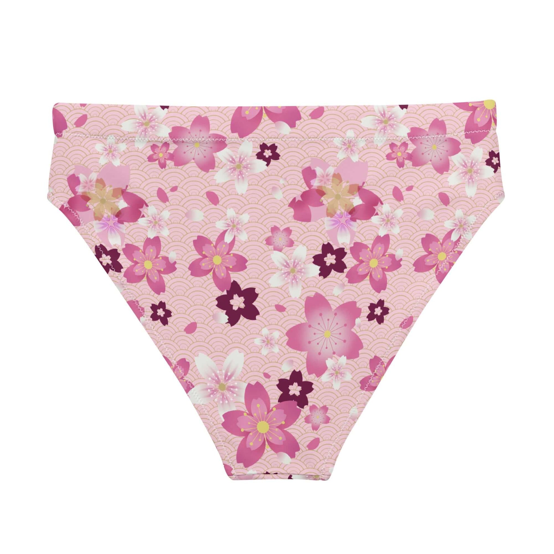 Stylish high-waisted Sakura Bikini Bottom features a floral design, perfect for beach days or spa visits.