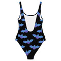 Stylish Lilith One-Piece Swimsuit featuring bats and clouds, perfect for a unique beach look.