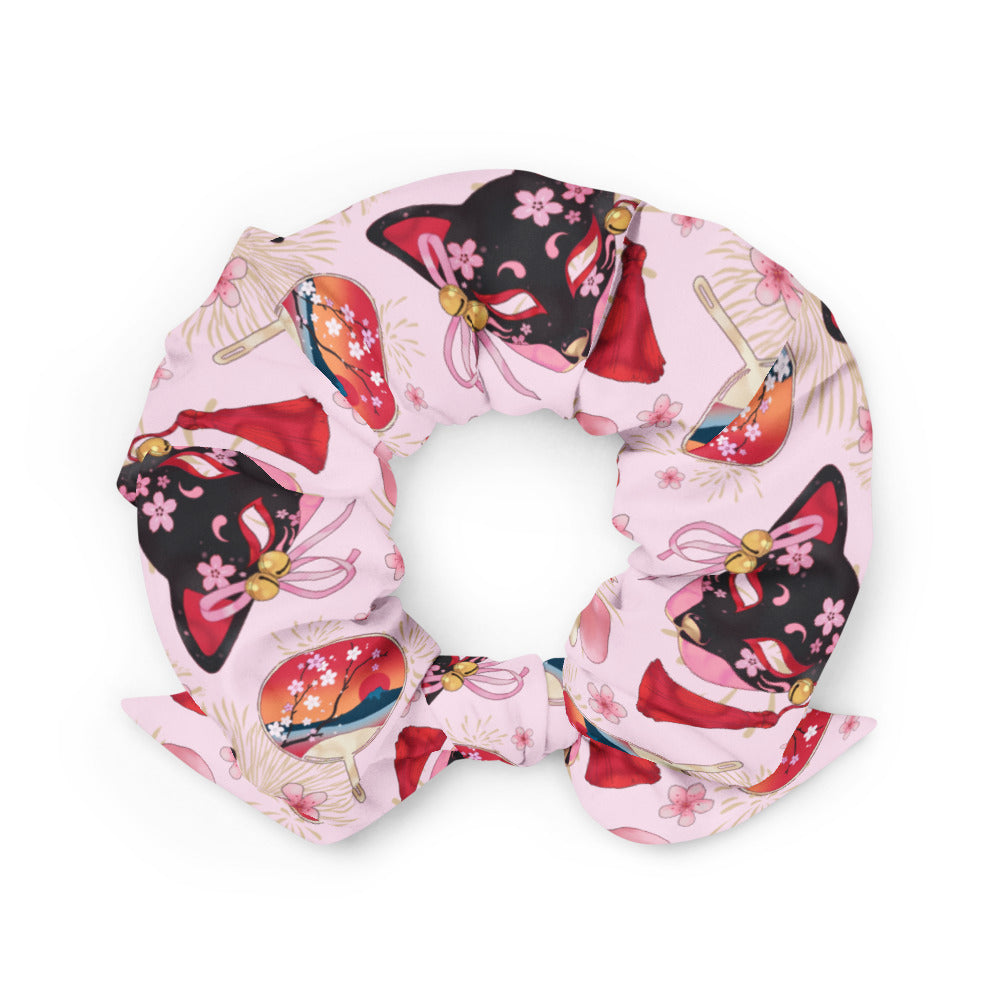 Add a stylish touch to your outfit with the trendy Matsuri Scrunchie, perfect for any occasion or workout.