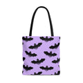 Stylish Morrigan Tote Bag (Black/Purple) features a unique bat design, perfect for any outfit or occasion.