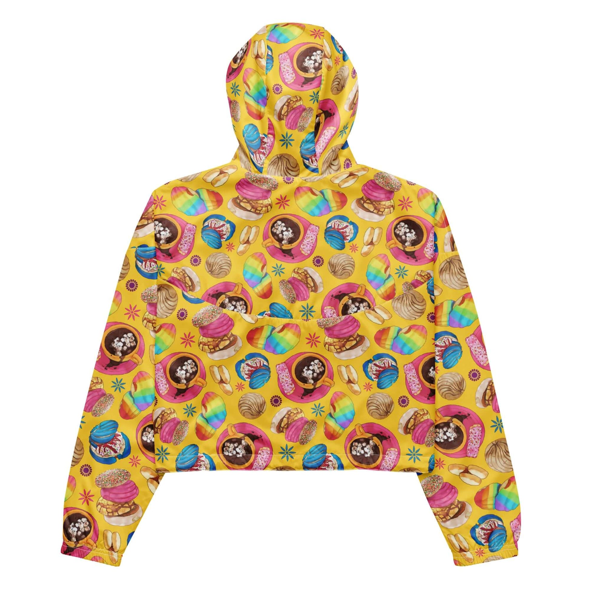 Bright and fun Pan Dulce cropped windbreaker, perfect for stylish hikes with waterproof protection and convenient pockets.
