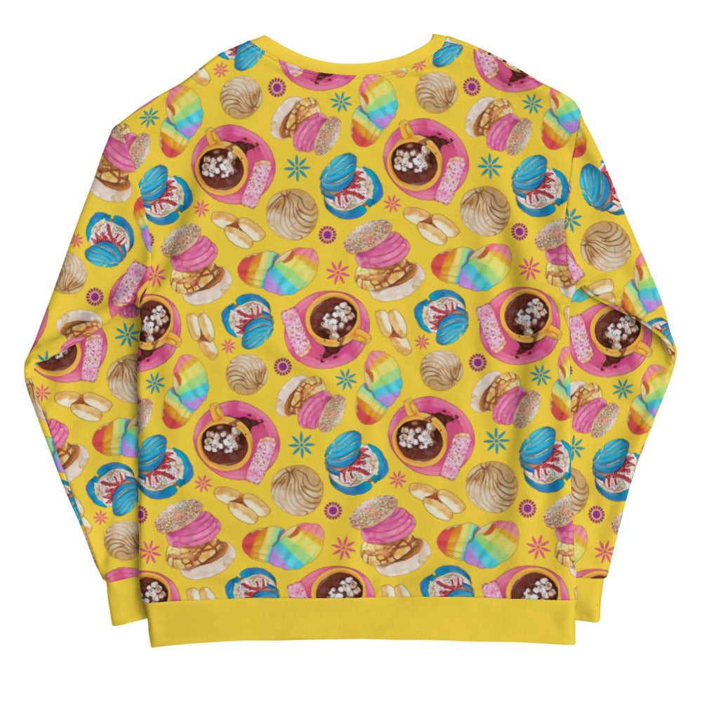 Bright yellow Pan Dulce Sweatshirt adorned with colorful baked goods, perfect for a cozy, sweet style.