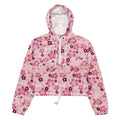 Lightweight and waterproof, the Sakura cropped windbreaker features a floral design and adjustable drawcords for comfort.