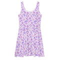 The Sea Princess Skater Dress features a colorful seashell print, perfect for summer outings or beach days.