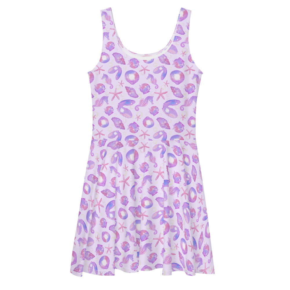 The Sea Princess Skater Dress features a colorful seashell print, perfect for summer outings or beach days.